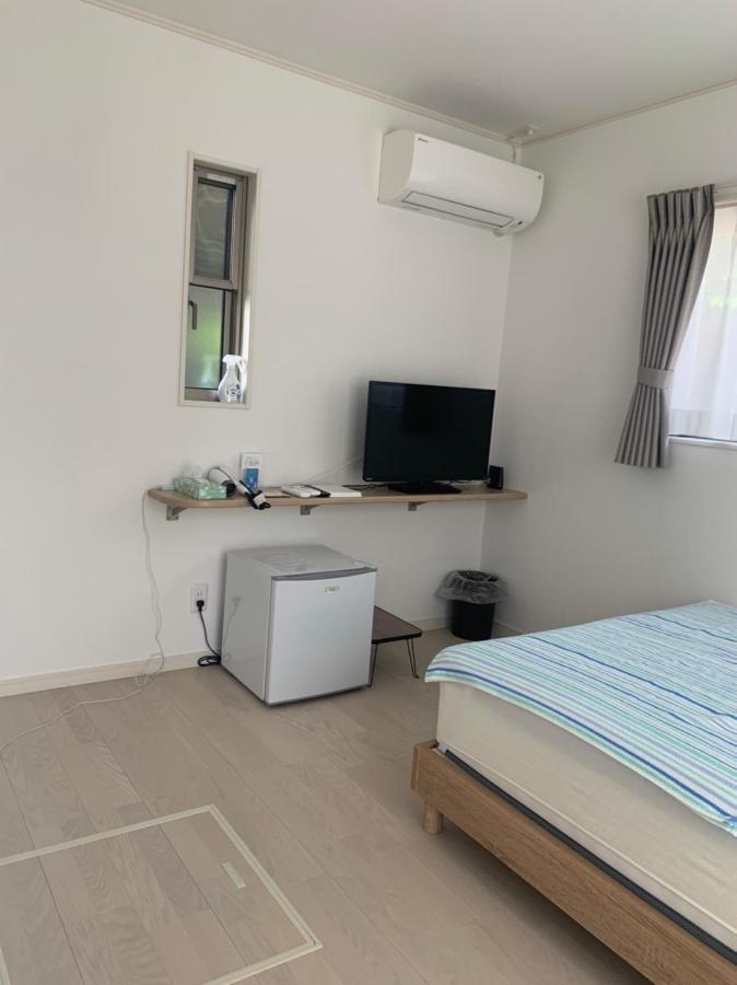 Blue House Apartment Nago Exterior photo